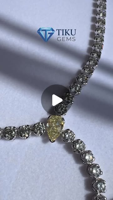 Artisan Yellow Diamond Necklace Reel Cover